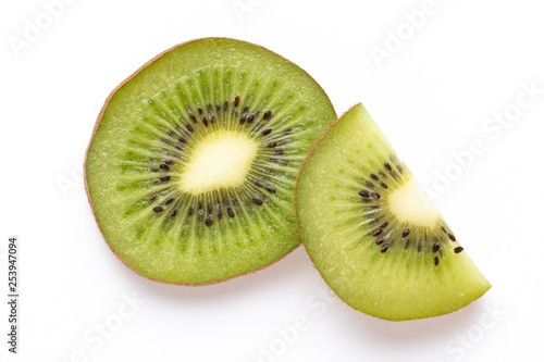 Kiwi fruit slices on white background.