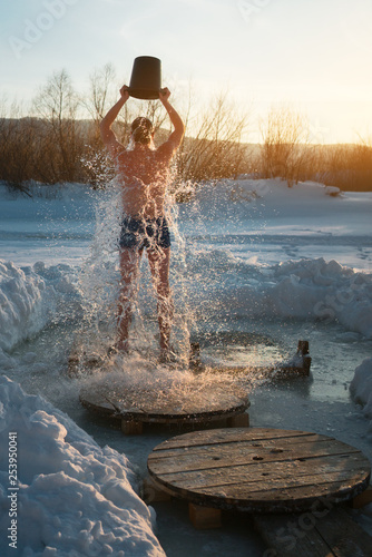 ice bucket shower. winter swimming.