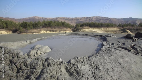 Interesting view mud volcano bubble boiling. Mud Volcanoes stand for one of the most interesting mixed reservations in Europe. Gas Coming Out of the Mud Volcanoes of Methane. Bubbling Mud Pool photo