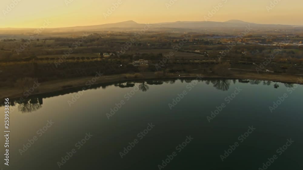 Cinematic Sunset Aerial Landscape 4K | Drone flight over a Lake and a street with moving cars in the background Cinematic Sunset Aerial Landscape 4K | Drone flight over a Lake and a street with moving cars in the background