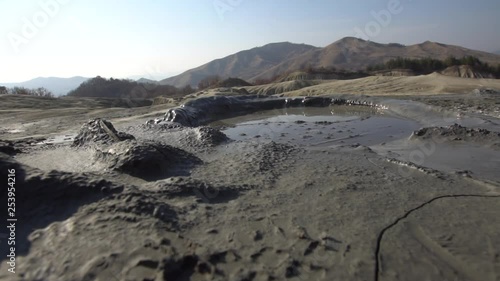 Interesting view mud volcano bubble boiling. Mud Volcanoes stand for one of the most interesting mixed reservations in Europe. Gas Coming Out of the Mud Volcanoes of Methane. Bubbling Mud Pool photo