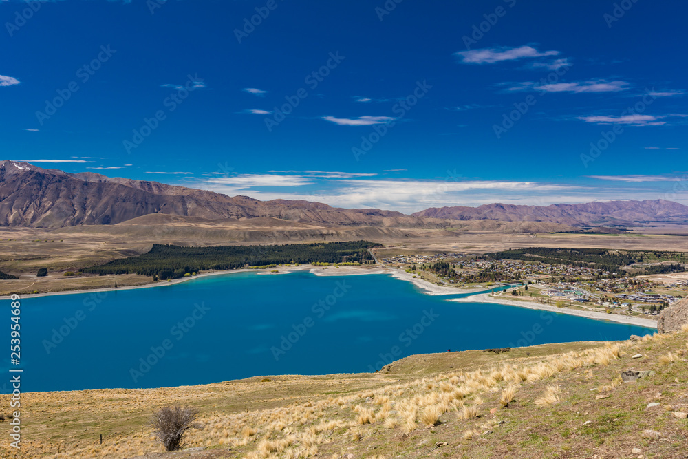 Lake Tekapo with reflection of sky and mountains, New Zealand