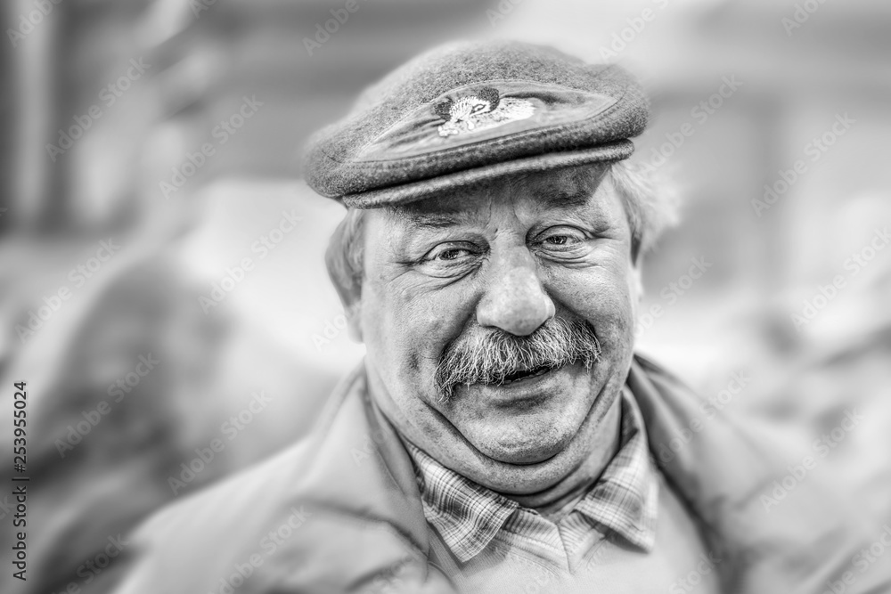 Cute friendly grandfather with hat and moustache Cute friendly grandfather with hat and moustache