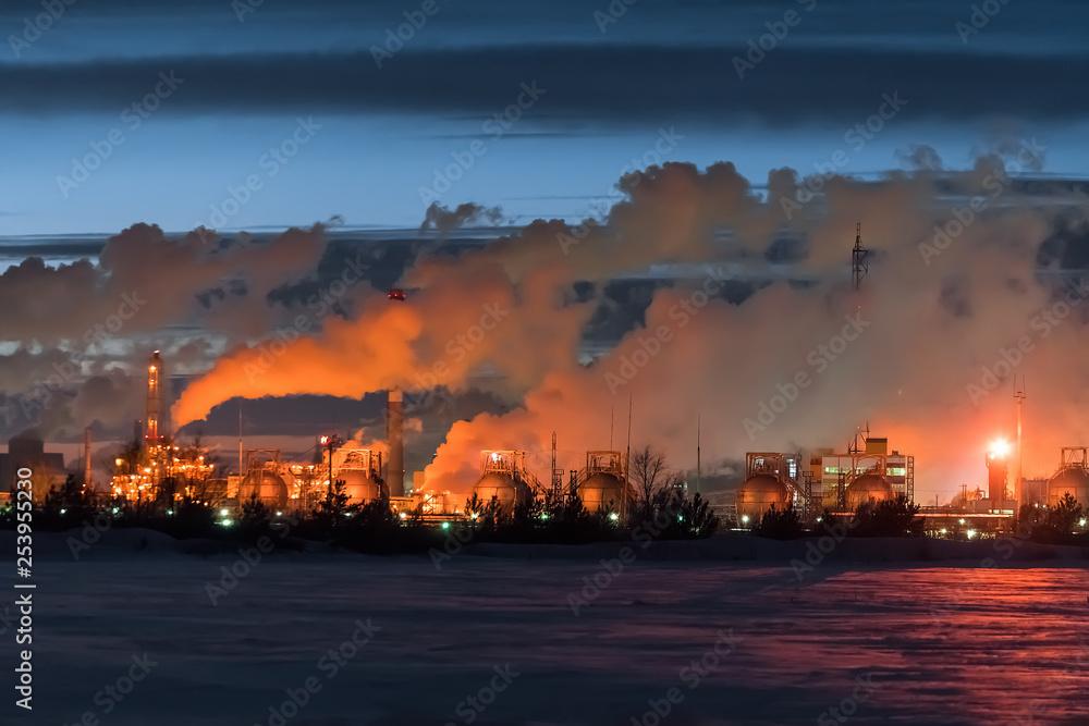 chemical or oil refinery factory. smokes. plastic manufacture.