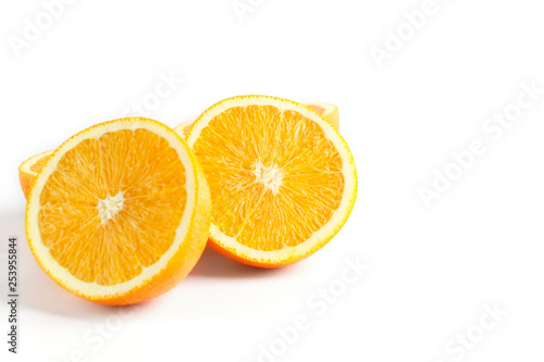 slices of fresh orange on white background