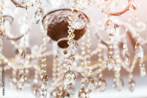 Crystal chandelier shimmers in light of close-up