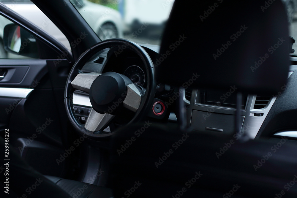 View of the interior of a modern automobile showing the dashboard View of the interior of a modern automobile showing the dashboard