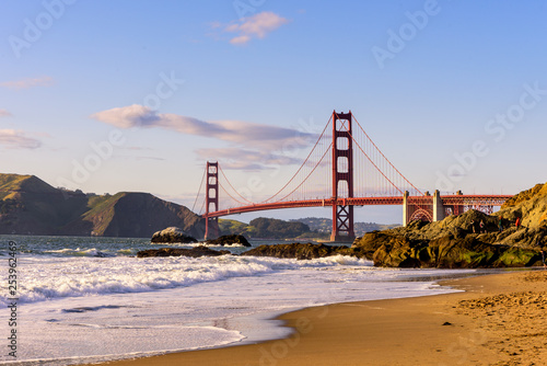 San Francisco Golden Gate Bridge Marshall beach at sunset, California