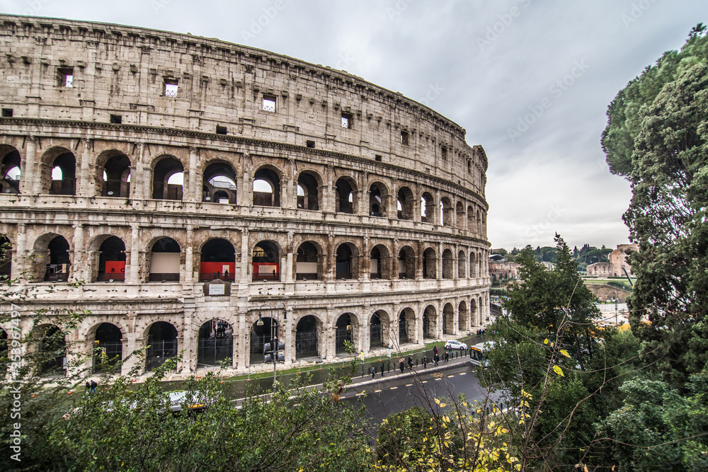 ROME, ITALY- November, 2018: Colloseum in Rome most remarkable landmark of Rome and Italy. Colosseum - elliptical amphitheatre in the centre of the city of Rome.