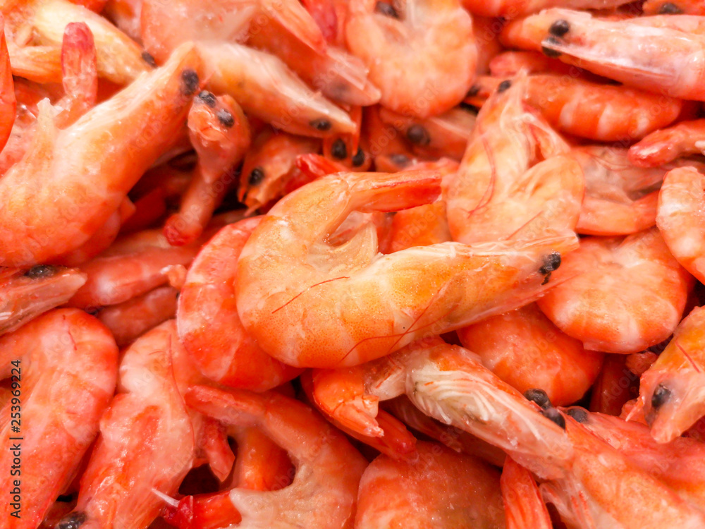 Frozen shrimp on the market shelf Frozen shrimp on the market shelf
