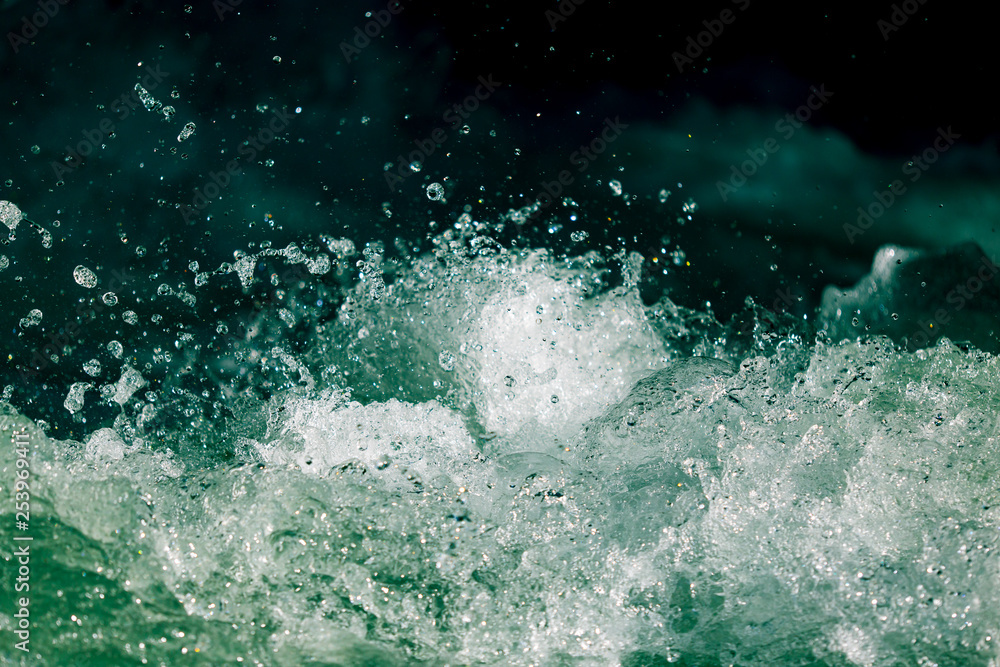Splashes of water from the waves in the sea Splashes of water from the waves in the sea