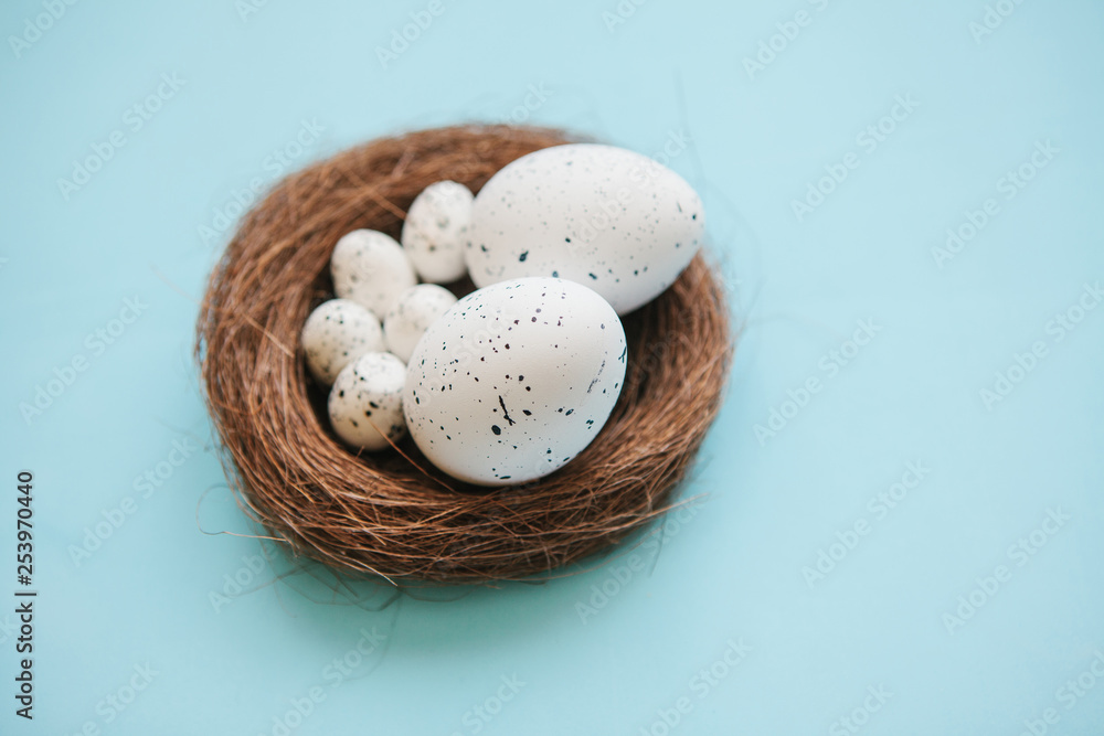 Traditional Easter eggs on a blue background. Easter celebration background. Traditional Easter eggs on a blue background. Easter celebration background.