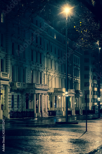 Street at night in rain, Exhibition Road, South Kensington, SW7, London, UK