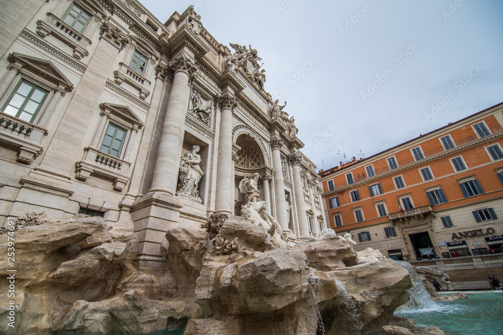 Trevi Fountain in the morning light in Rome, Italy. Trevi is most famous fountain of Rome. Architecture and landmark of Rome.