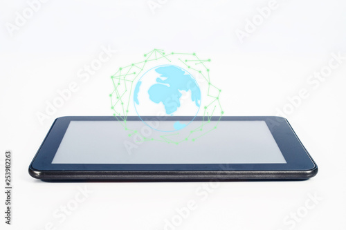 Wallpaper Mural Global light sign over mobile tablet for Online shopping and ecommerce. Torontodigital.ca