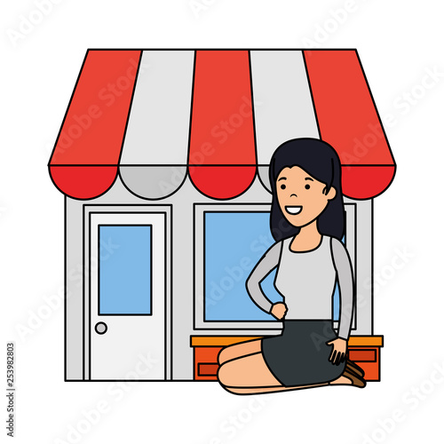 young woman in lotus position with store building