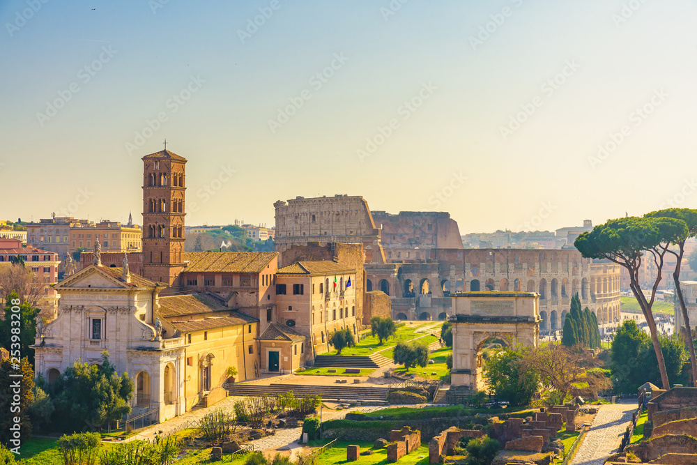 Rome, Italy city skyline with landmarks Colosseum and Roman Forum view from Palatine hill