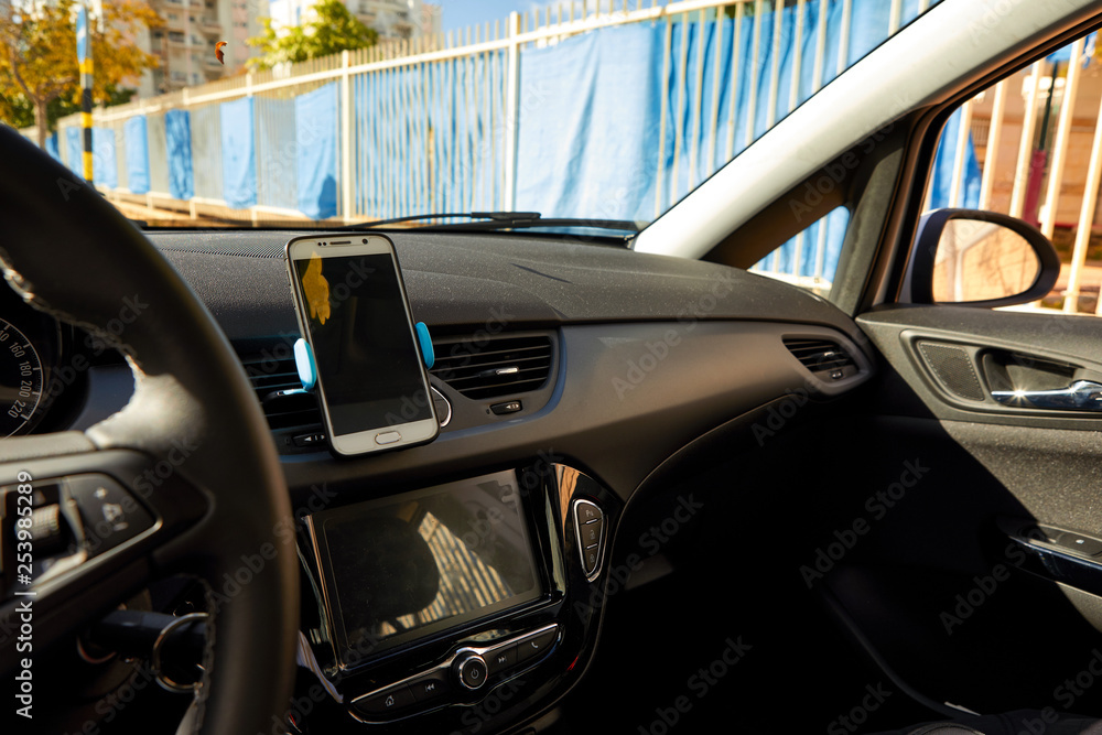 Universal mount holder for smart phones. Car dashboard or wind-shield holder bracket for mobile phone 