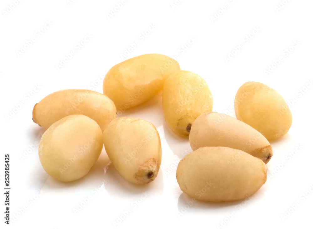 Cedar Pine nuts on a white background Cedar Pine nuts on a white background
