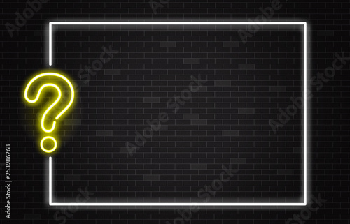 Quiz banner with yellow neon question mark in realistic style on dark brick wall background. photo
