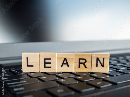 Word spell Learn over laptop keyboard 1