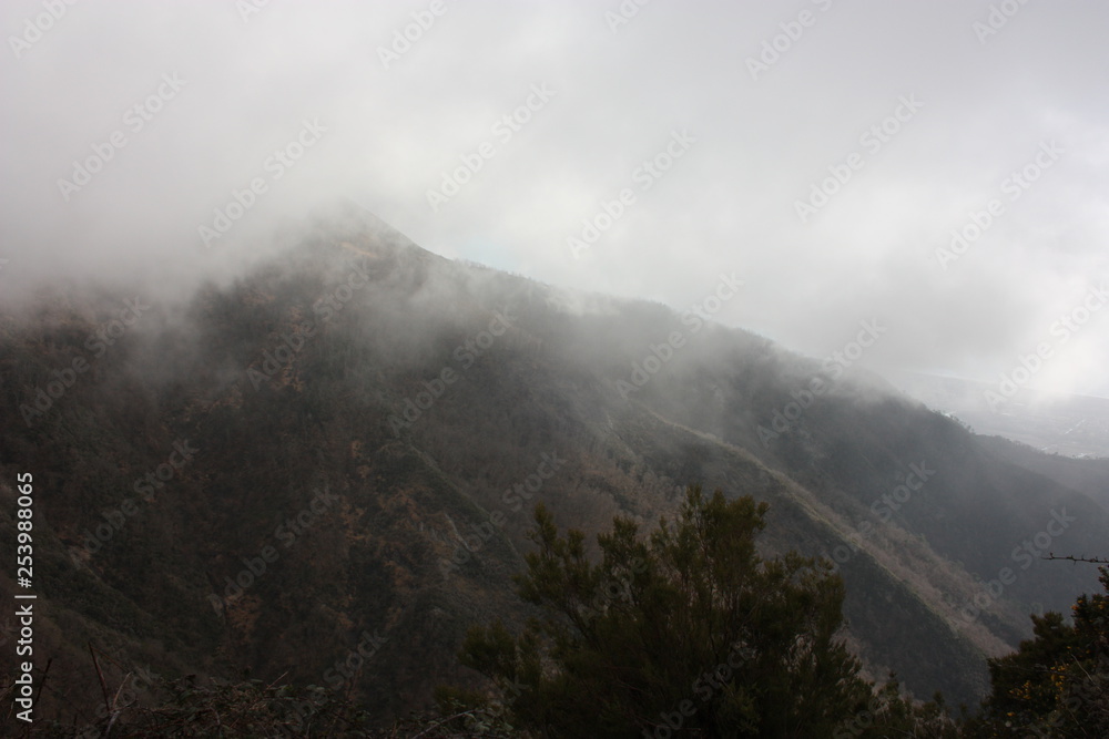 thick and dense fog between the peaks of the Apuan Alps in Tuscany