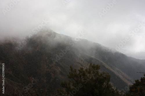 thick and dense fog between the peaks of the Apuan Alps in Tuscany