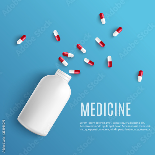 Capsule pills pouring out of white blank bottle in realistic style isolated on blue background with copy space.