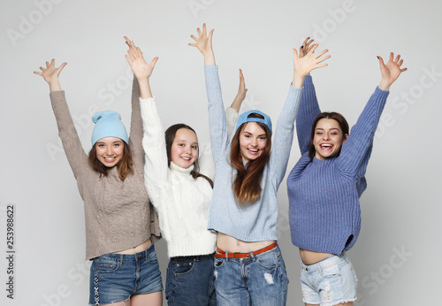 group of four girls friends of different nationalities