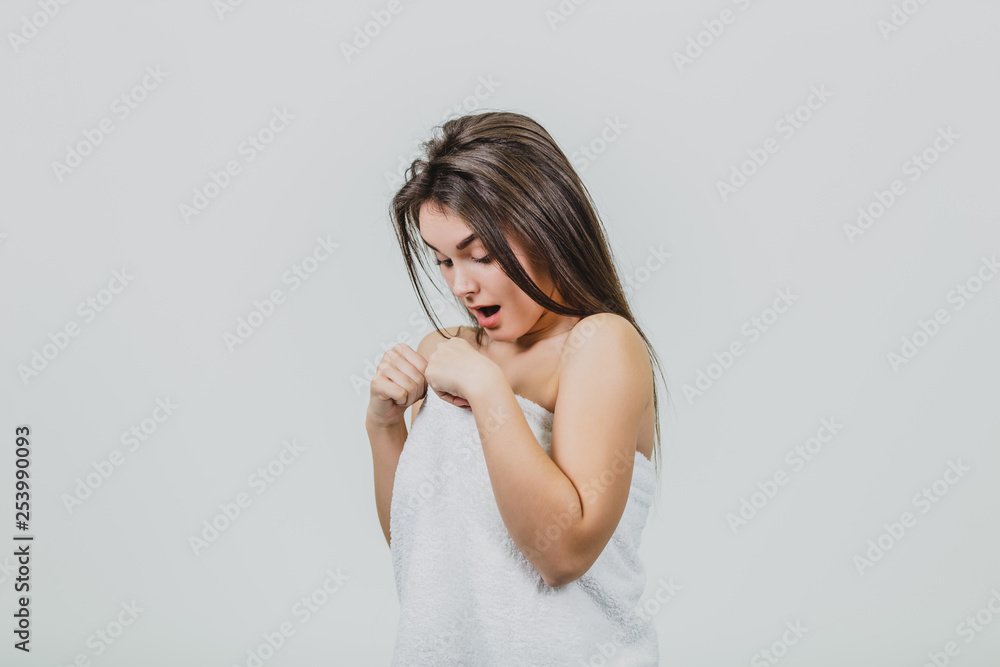 Beautiful girl with beautiful makeup, young skin care concept. Photo of an attractive brunette girl on a white background. Beautiful girl with beautiful makeup, young skin care concept. Photo of an attractive brunette girl on a white background.