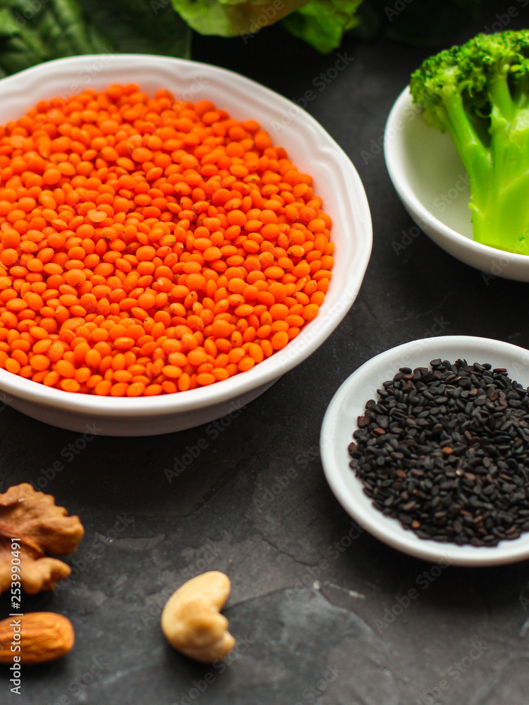 Lentils orange, healthy food concept (legumes, greens, spinach, micro greens and more) superfood. Food background Lentils orange, healthy food concept (legumes, greens, spinach, micro greens and more) superfood. Food background