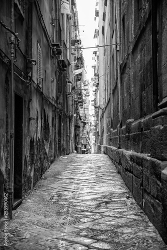 Naples, Italy - August 08, 2015 : Narrow streets of Naples, black and white photographs.