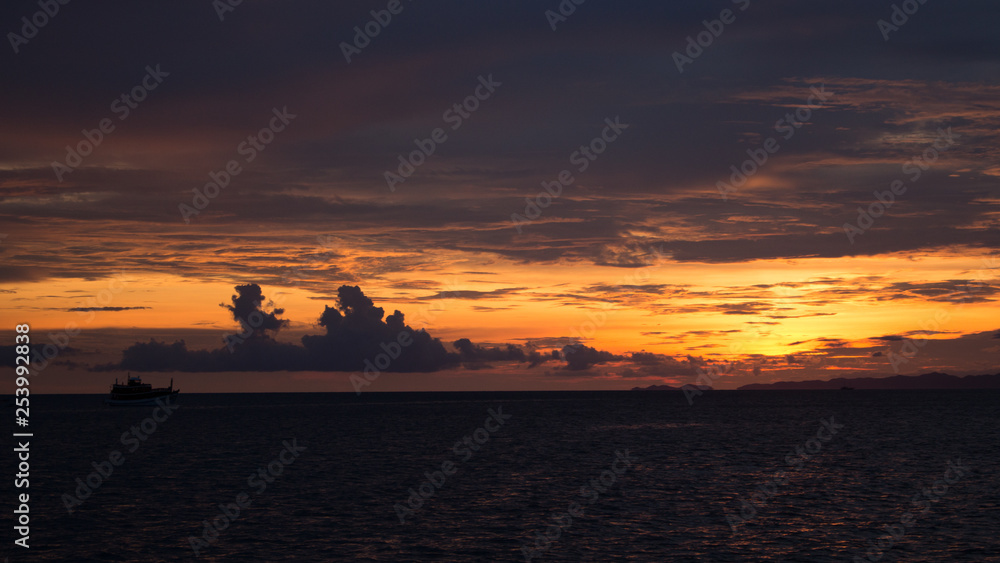 Cloudy sunset over the horizon at Railay Beach, Phuket, Thailand