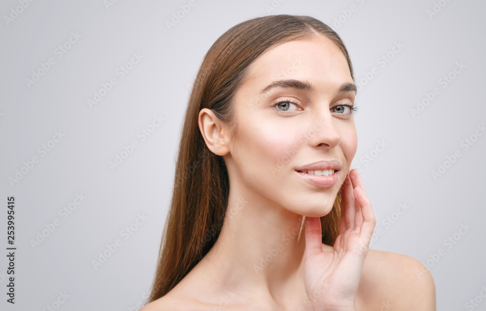 Healthy skin beauty woman face closeup natural makeup beautiful young happy model isolated on white Healthy skin beauty woman face closeup natural makeup beautiful young happy model isolated on white