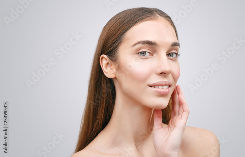 Healthy skin beauty woman face closeup natural makeup beautiful young happy model isolated on white
