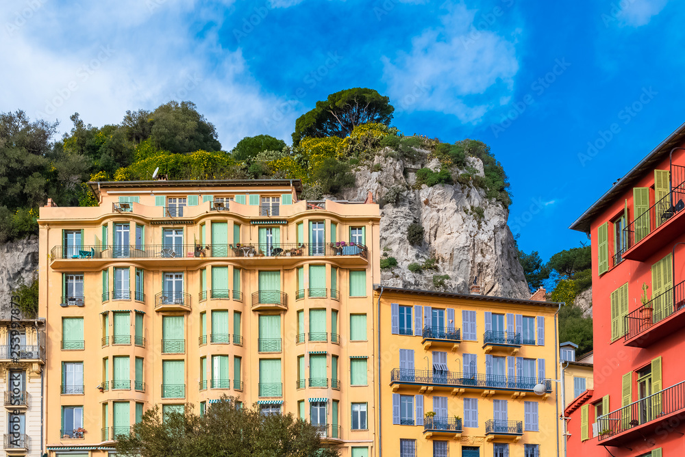 Naklejka premium Nice, France, beautiful houses built on hillside, on the marina, with typical windows and shutters