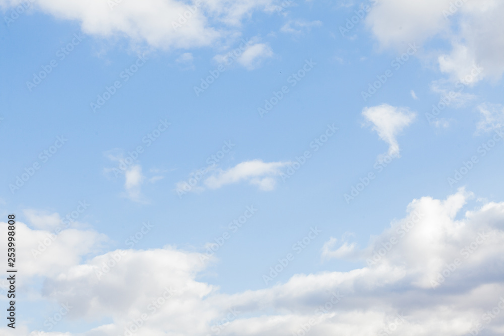 Blue sky background with clouds. White clouds on blue sky Blue sky background with clouds. White clouds on blue sky