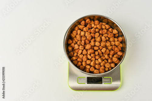 dry dog food on scales