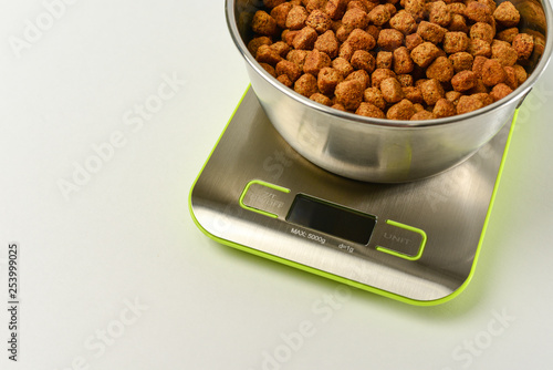 dry dog food on scales