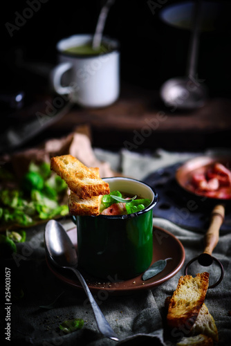 Brussels sprouts soup with bacon.dark photo photo