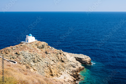 Sifnos Eptamartyres Church in Kastro standing on the top of a rocky cape. Sifnos island, Greece