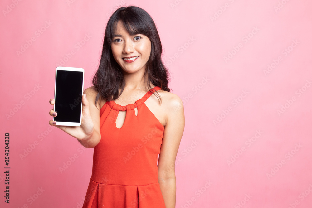 Young Asian woman with mobile phone. Young Asian woman with mobile phone.