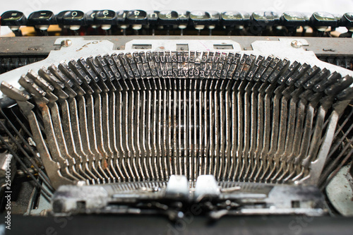 Antique typewriter, vintage typewriter machine, close up of typewriter keys photo