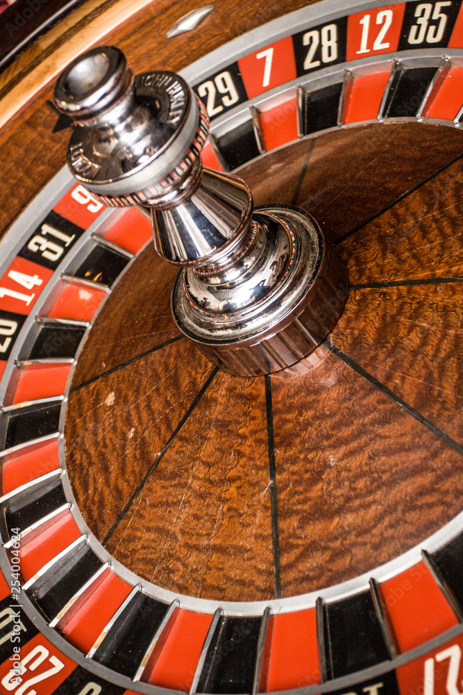 roulette accessories on red gaming table roulette accessories on red gaming table