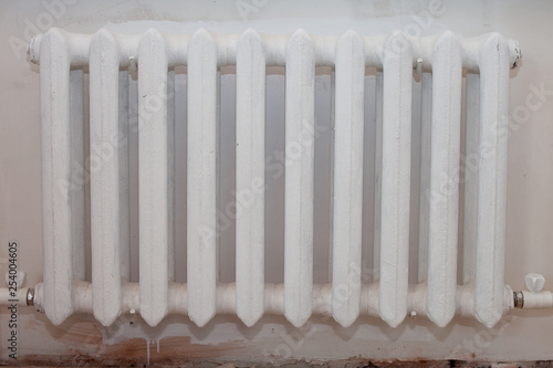 Wallpaper Mural White radiator heating of cast iron. Space heating. Torontodigital.ca