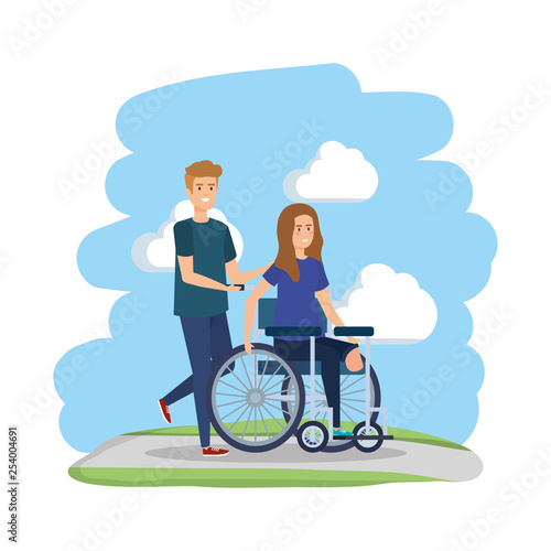 young woman in wheelchair with male helper