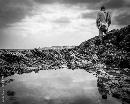 Man on the rocks © Andr