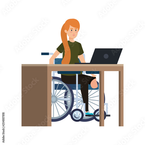 young woman in wheelchair working in the office