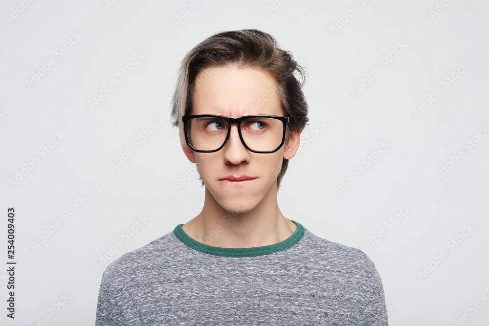 photo of stupefied handsome male has shocked expression, being surprised, isolated overwhite background. photo of stupefied handsome male has shocked expression, being surprised, isolated overwhite background.