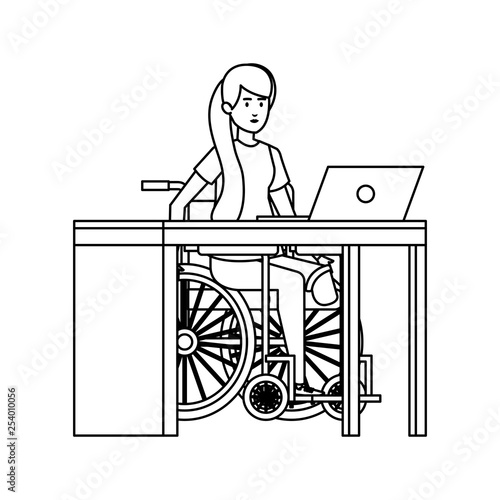 young woman in wheelchair working in the office